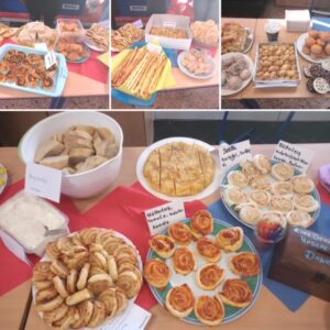 Ausschnitte des Buffet mit Pizzaschnecken, Brot, Käsestangen, Süßspeisen